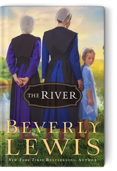 Two Amish women and a little girl standing by a river